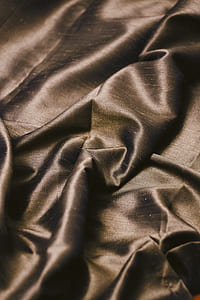brown textile thumbnail