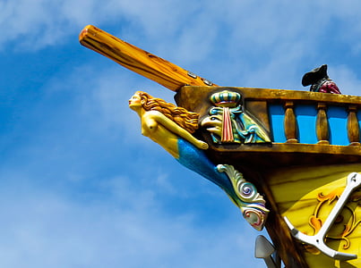 mermaid ship decor during daytime thumbnail