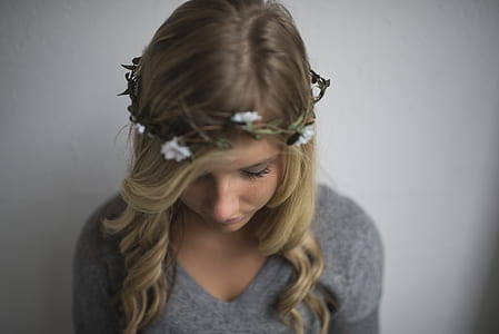 photo of woman looking down thumbnail