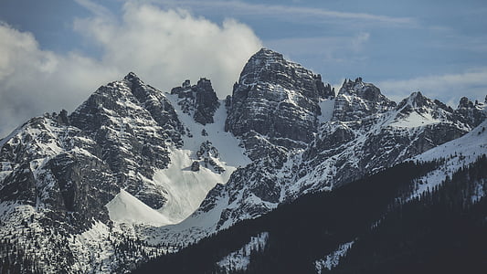 snow covered mountain with clouds thumbnail