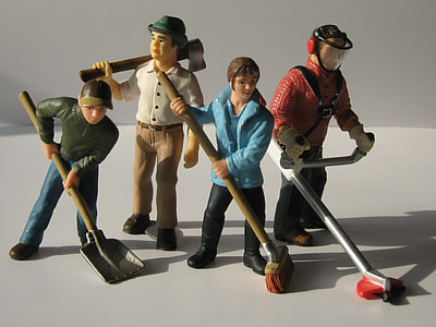 four male character figurines on white surface thumbnail