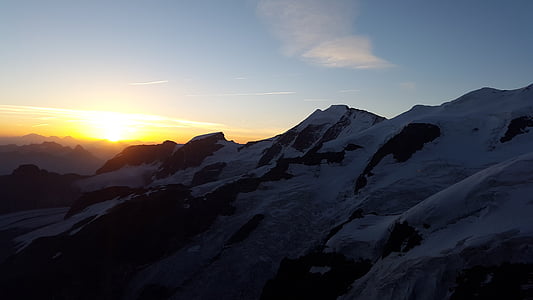 glacier mountain range during golden hour thumbnail