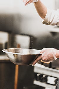 white powder sprinkle on stainless steel bowl thumbnail