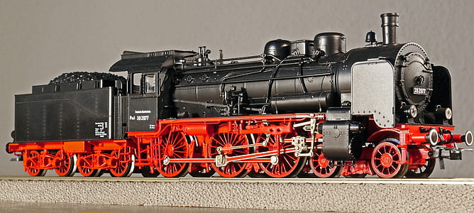 black and red locomotive train photo thumbnail