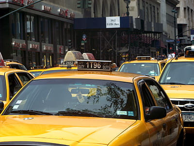yellow taxi with 1T96 license plate thumbnail