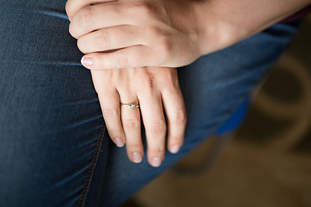Close-up of woman's hands with a ring thumbnail