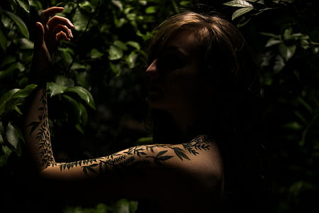woman with tattoo portrait photo thumbnail