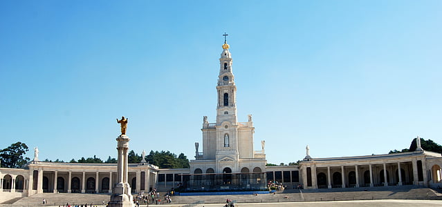 white structure in front of statue thumbnail