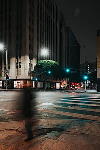 gray high-rise building at nighttime thumbnail