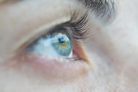 close up photography of person's eye thumbnail