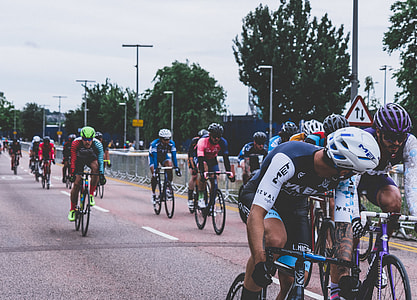 men riding a bicycle during day race thumbnail