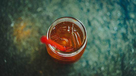 photo of clear jar filled with orange liquid thumbnail