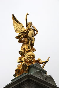 low angle photography of golden angel statue thumbnail