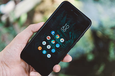 Person Holding Black Android Smartphone With Black Case thumbnail
