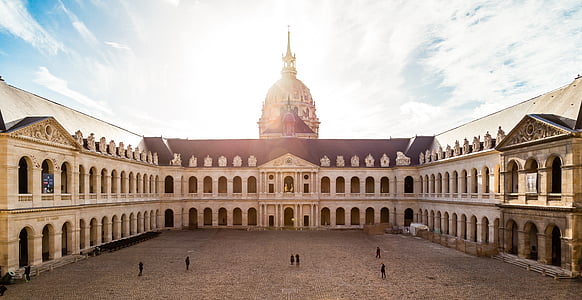 people surrounded by white building thumbnail