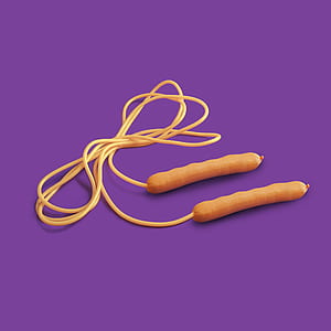orange skipping rope on purple surface thumbnail