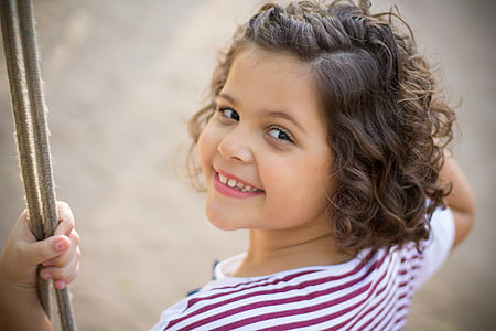 girl wearing white and red striped top thumbnail