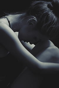 woman in dim room thumbnail