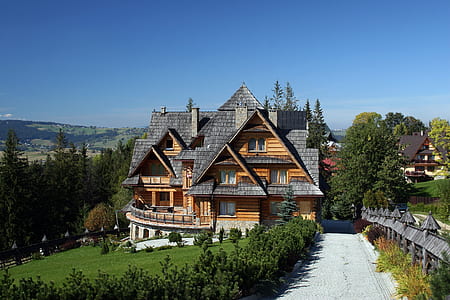brown and gray wooden 2-sotorey house thumbnail