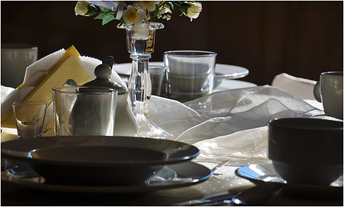 assorted glass dinnerware set on table thumbnail
