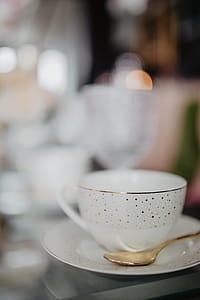 Porcelain and glass dishware on the glass table thumbnail