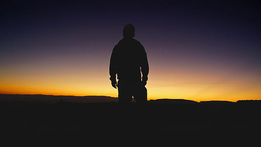 silhouette of man standing thumbnail