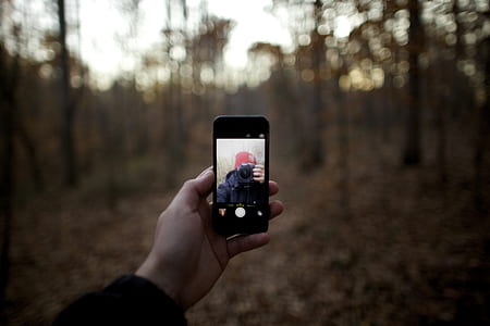 person taking picture of his self thumbnail