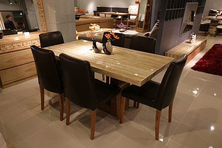 brown wooden table and six black parson chairs dining set thumbnail