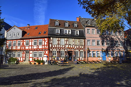 three assorted-color houses thumbnail
