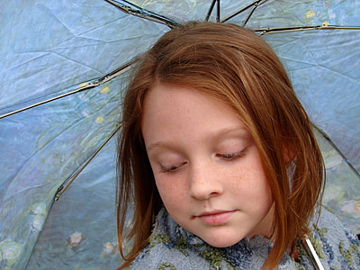 girl holding umbrella thumbnail
