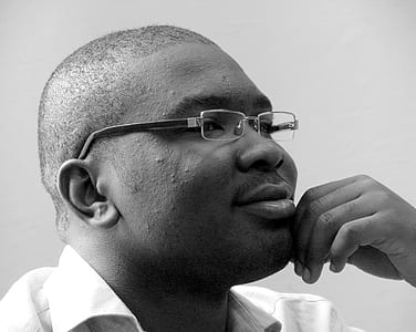 smiling man wearing eyeglasses thumbnail