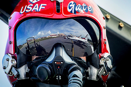 closeup of USAF fighter jet plane pilot on red helmet thumbnail
