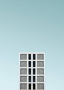 minimalist photography of white building thumbnail