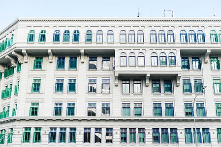 white building with glass window thumbnail