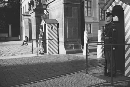 Two Guards in Post During Daytime thumbnail
