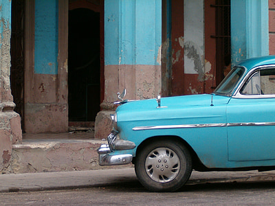 vintage blue car on roadside during daytime thumbnail