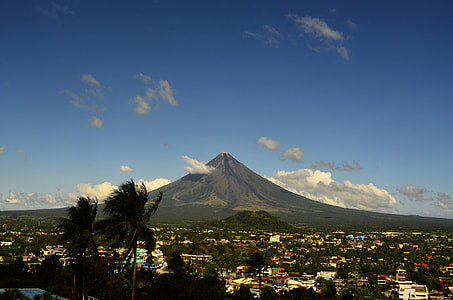 Mountain rising above the landscape of the town in the Philippines thumbnail