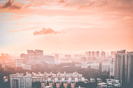 high angle photography of buildings at sunset thumbnail