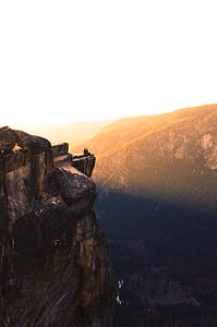 two people on mountain cliff thumbnail