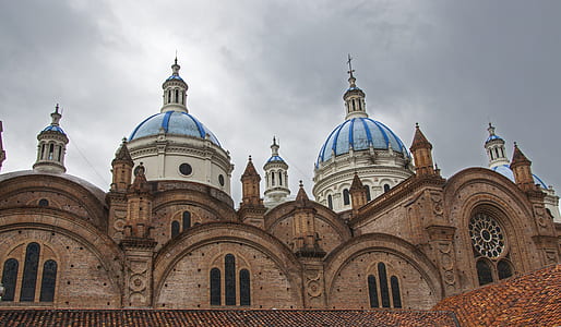 brown and blue dome building at daytime thumbnail