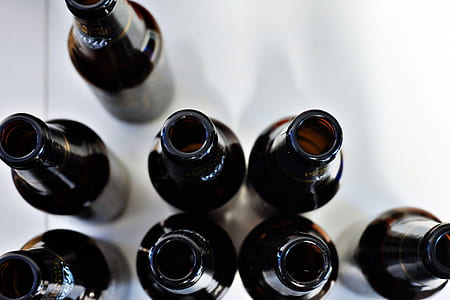 eight bottles on white surface thumbnail
