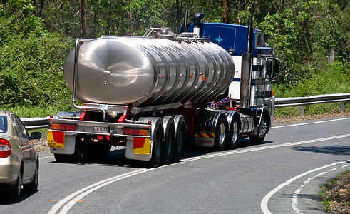 white freight truck on road thumbnail