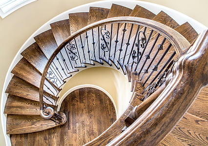 high angle view of brown spiral stairs thumbnail