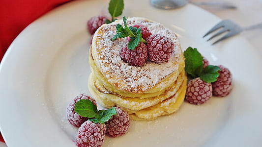 cake with berries on plate thumbnail