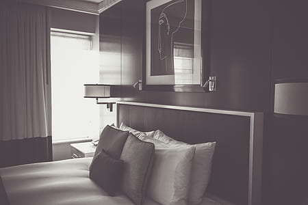 grayscale photo of bed and photo frame thumbnail