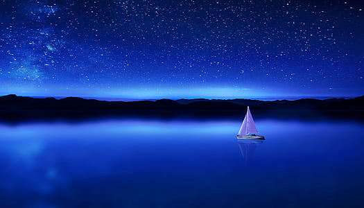 white boat near island during nighttime thumbnail
