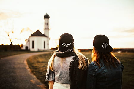 Woman Wearing Black Snapback Cap thumbnail