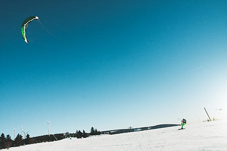 Man Skiing on Snow Covered Landscape thumbnail