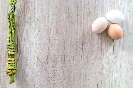 three eggs on brown wooden board thumbnail
