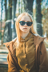 woman wearing brown zip-up jacket thumbnail